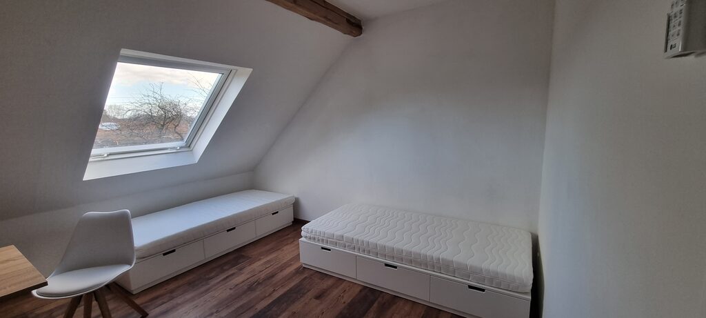 Schlafzimmer mit zwei Einzelbetten in einer Wohnung in Hamminkeln-Mehrhoog